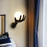 Zen Artistic Hand Globe Wall Lamp