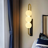 Trellix Triple Frosted Glass Globe LED Wall Lamp
